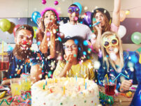 confetti-flying-around-group-celebrating-a-party-PZSGJ5F-1-1.jpg
